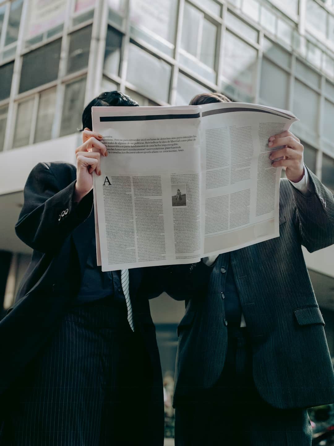 Business professional reading news on Google My Business paid version update