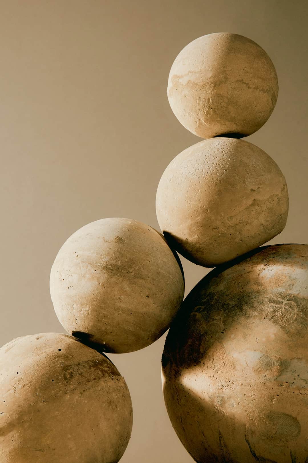 Stacked stone spheres symbolizing content foundation