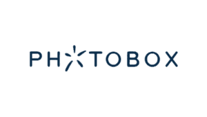 PhotoBox logo with navy lettering and starburst icon design
