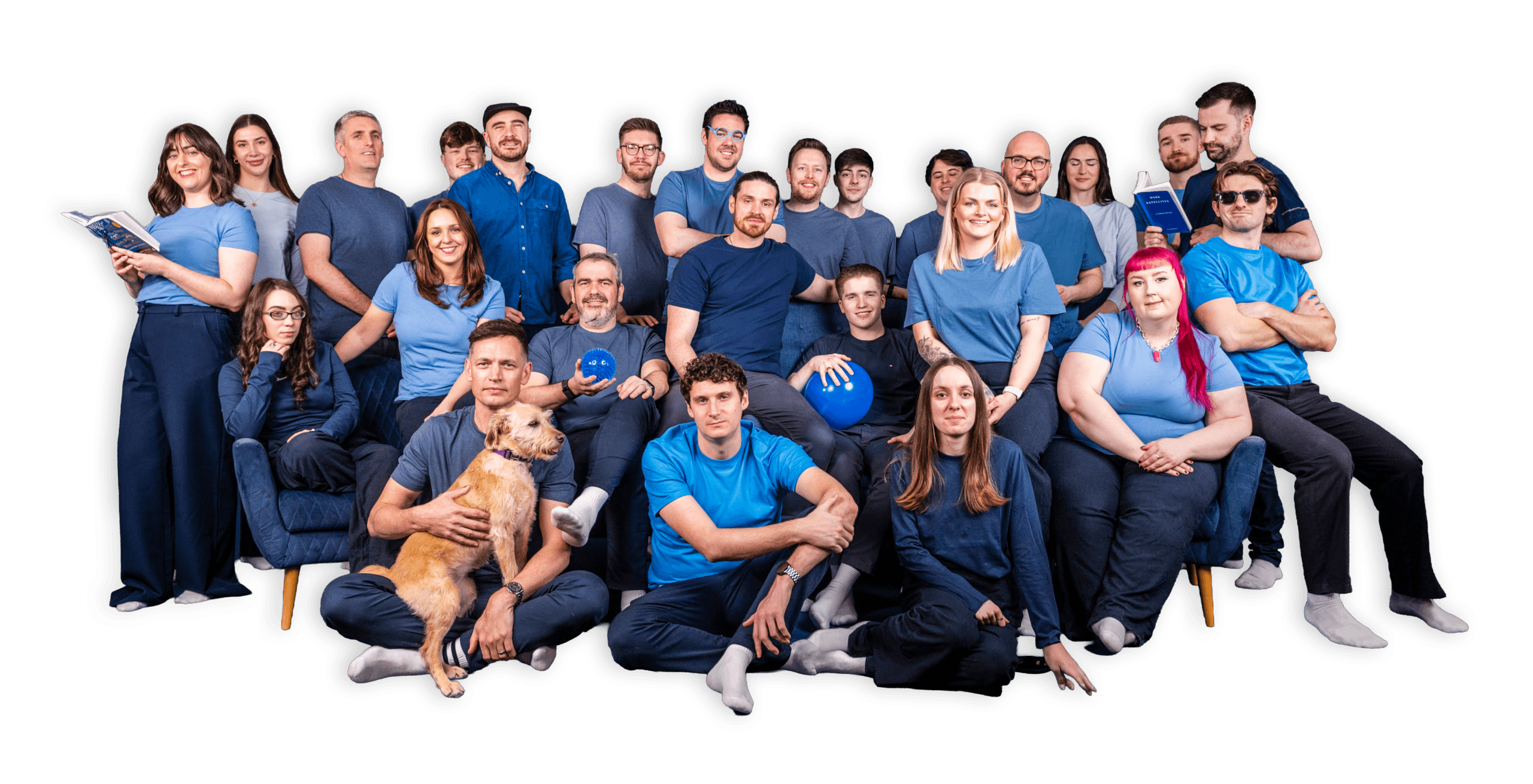 Salience search marketing team in coordinated blue clothing posing for group photo