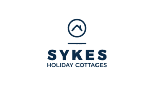 Sykes Holiday Cottages logo with circular house roof symbol in navy