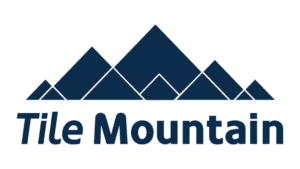 Tile Mountain logo featuring geometric navy blue mountain peaks