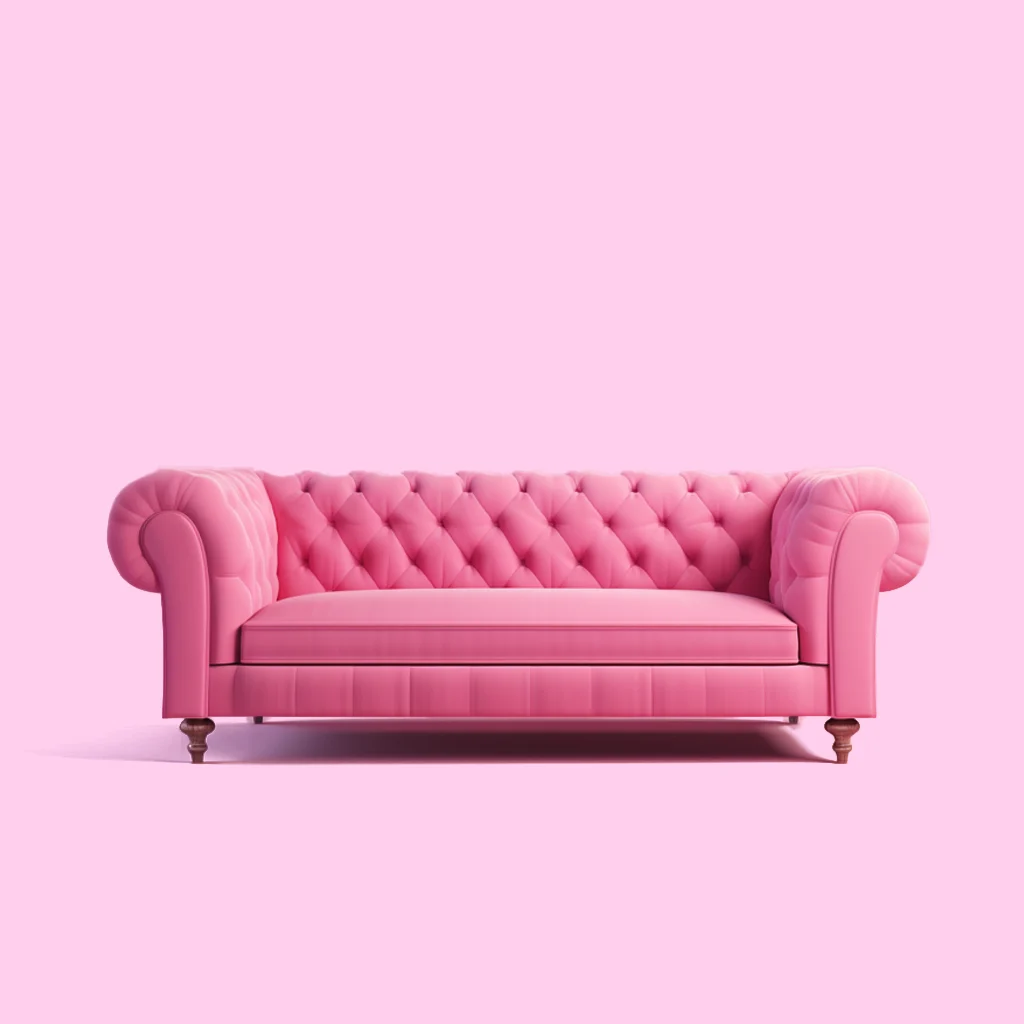Pink Chesterfield sofa on a pink background, highlighting DFS's style in their successful SEO strategy analysis.