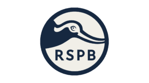 RSPB logo featuring a stylized bird head within a circular design.