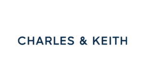 Charles & Keith logo in dark blue lettering on a transparent background