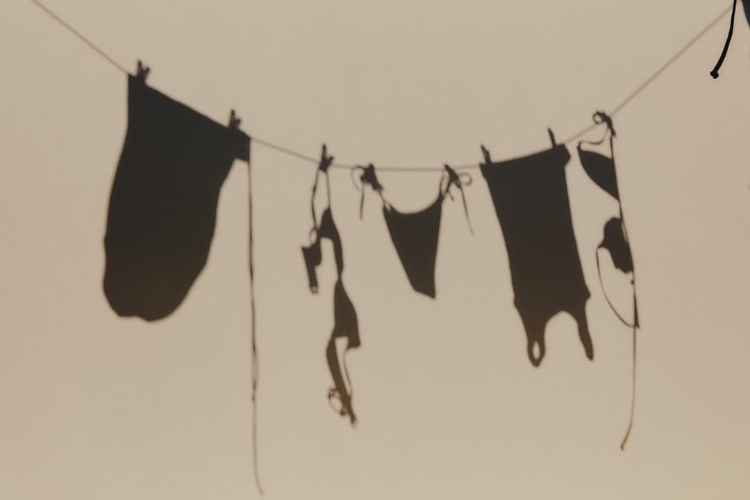 Black lingerie hanging on clothesline for sustainable air-drying