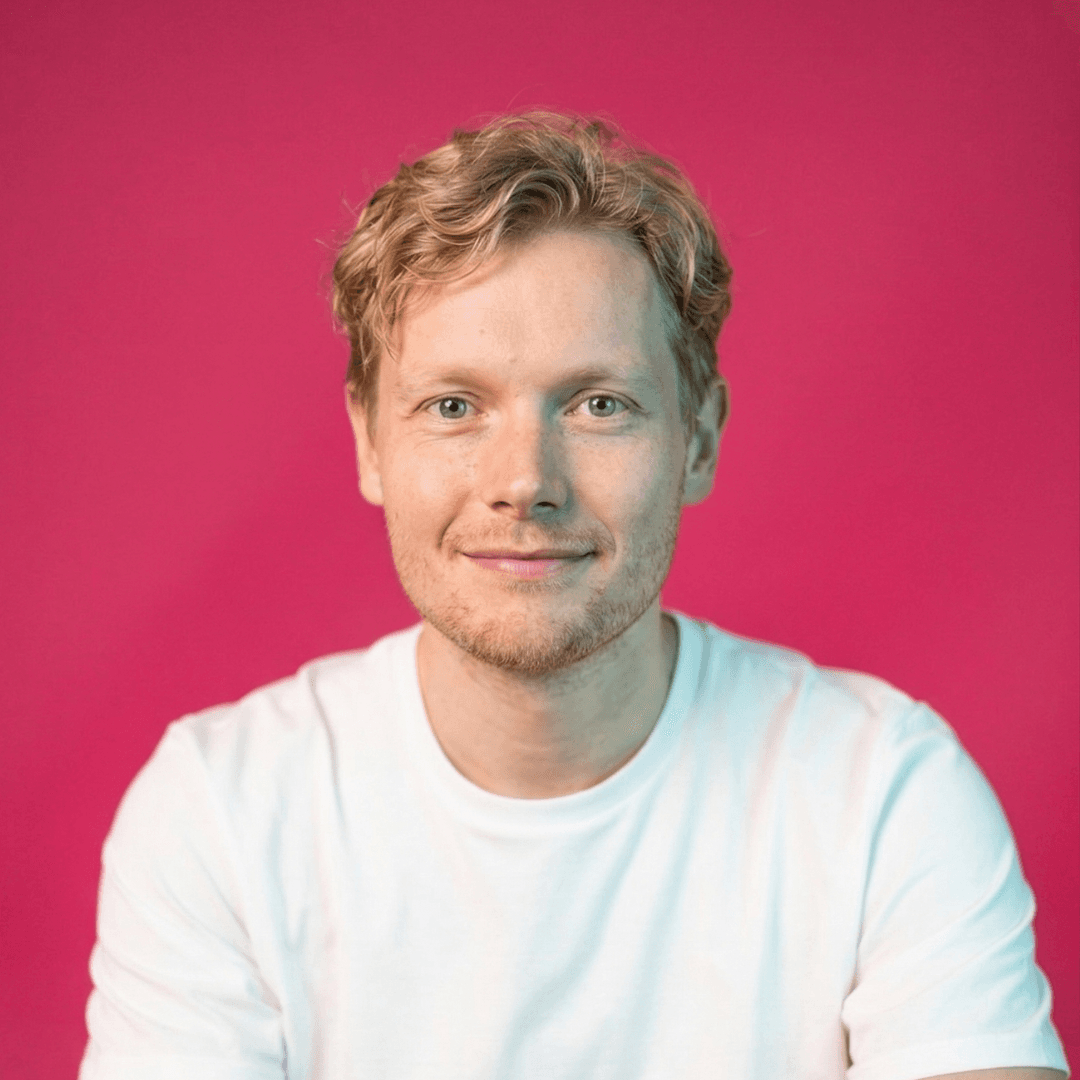Martyn, Salience search marketing team member, professional headshot on pink background