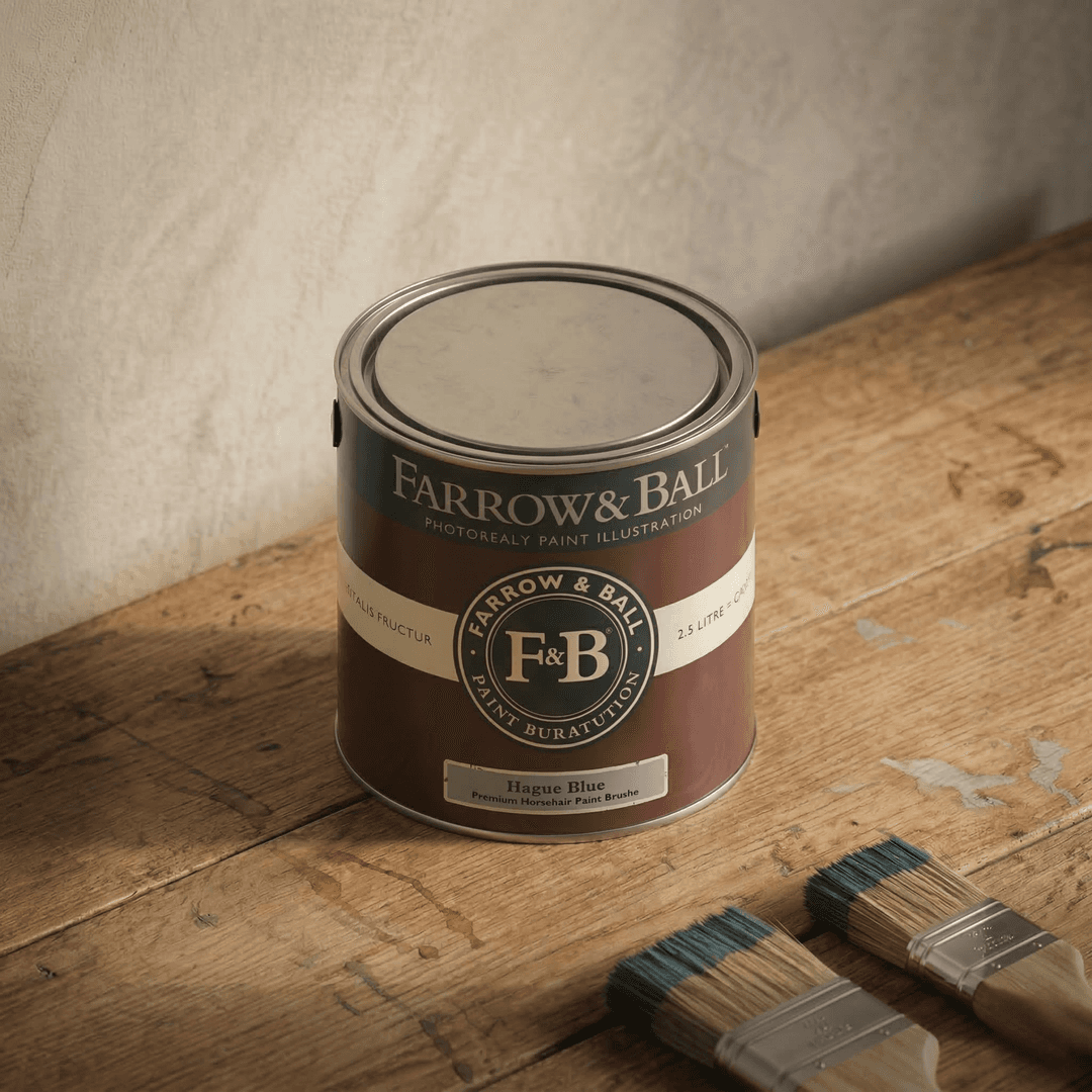 Farrow & Ball Hague Blue interior paint can with brushes on wooden floor