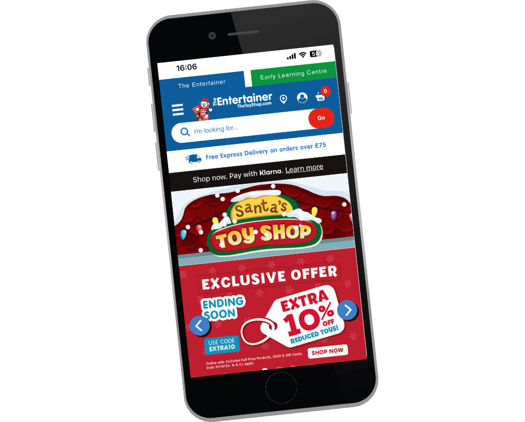 Mobile view of toy shop exclusive offer with 10% discount at The Entertainer, showcasing Santa's Toy Shop banner.