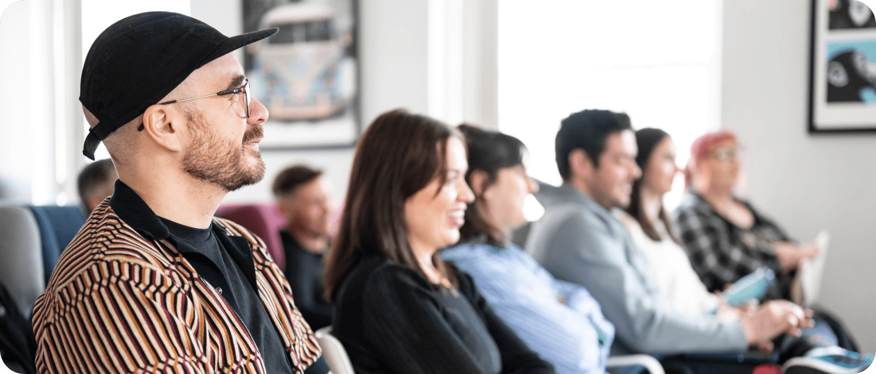 Audience engaged in a presentation at Salience office, highlighting team culture and career opportunities.
