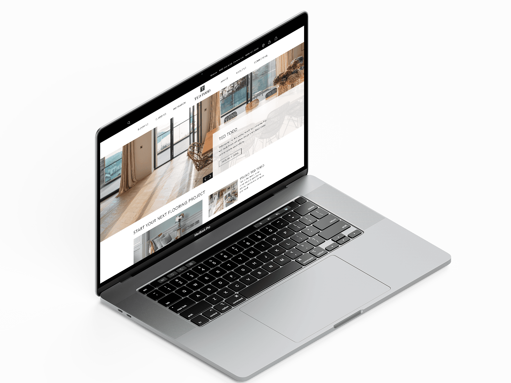 Gray laptop displaying Salience marketing agency website with text and images.