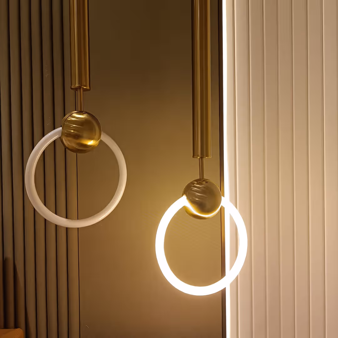 Stylish modern pendant lights with circular design in a minimalist interior. (Photo: Livia Siu via Pexels)