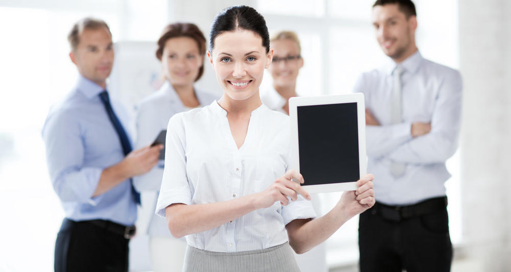 Typical stock photo with smiling women holding iPad