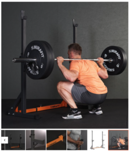 Picture of a man barbell squatting 